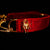 Gold-tone spider and O-ring details on scarlet velvet
