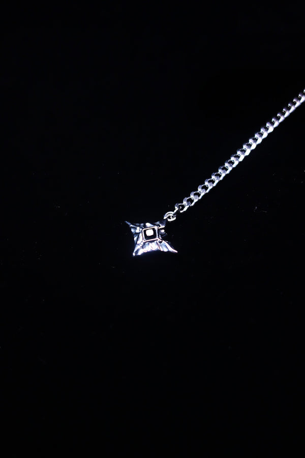 Black crystal geometric drop detail