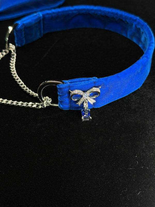 Rhinestone bow detail on royal blue velvet choker