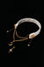 FROSTED STELLA white snowflake choker with gold-tone chains and star and moon drops