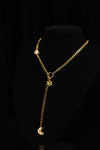 MY CONSTANT STAR necklace styled with a long moon pendant drop on a black bust