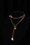 MY CONSTANT STAR necklace wrapped around the neckline for a layered silhouette