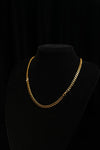 Verdant Relic gold-tone Cuban chain worn alone