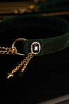 Jewel-framed purple zircon detail