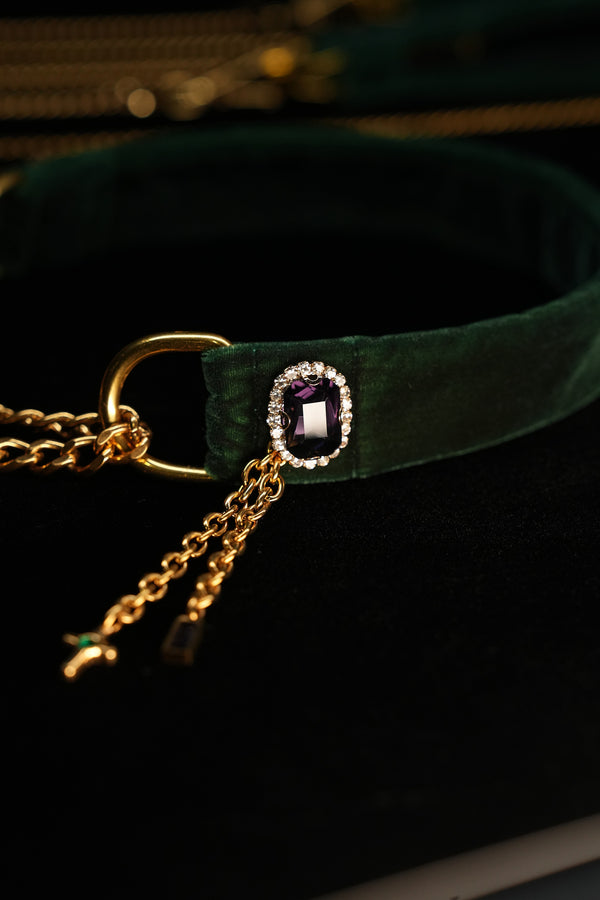 Jewel-framed purple zircon detail