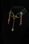 Close-fitting forest green velvet choker styling